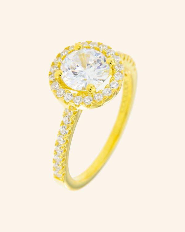 Anillo Tao dorado con circonitas