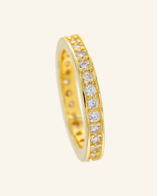 Anillo Tiber dorado con circonitas blancas